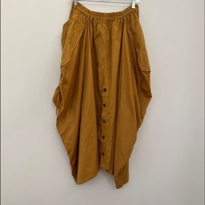 Cocorico gold cotton transformable skirt/pant, sz M, never worn. NWOT.